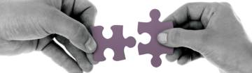 an image of two puzzle pieces to illustrate communication