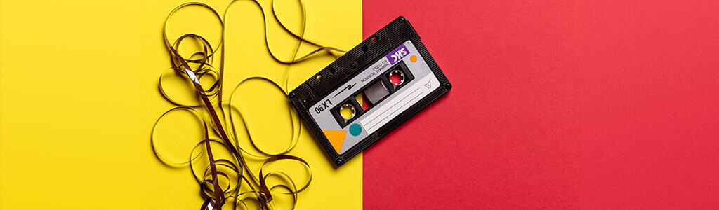 image of an audio tape cassette to illustrate the beginning of on-hold technology